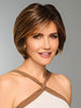Model is wearing EFFORTLESS STYLE by RAQUEL WELCH in color RL8/29SS SHADED HAZELNUT | Warm Medium Brown Evenly Blended with Ginger Blonde with Dark Roots