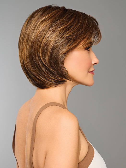 Model is wearing EFFORTLESS STYLE by RAQUEL WELCH in color RL8/29SS SHADED HAZELNUT | Warm Medium Brown Evenly Blended with Ginger Blonde with Dark Roots