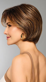 Model is wearing EFFORTLESS STYLE by RAQUEL WELCH in color RL8/29SS SHADED HAZELNUT | Warm Medium Brown Evenly Blended with Ginger Blonde with Dark Roots