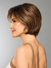 Model is wearing EFFORTLESS STYLE by RAQUEL WELCH in color RL8/29SS SHADED HAZELNUT | Warm Medium Brown Evenly Blended with Ginger Blonde with Dark Roots