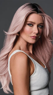 Model is wearing QUEUE THE HUE by RAQUEL WELCH in color PINK