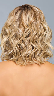 Model is wearing ROMANTIC RENAISSANCE in color RL19/23SS SHADED BISCUIT | Light Ash Blonde Evenly Blended with Cool Platinum Blonde and Dark Roots