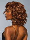 Model is wearing ROMANTIC RENAISSANCE in color RL32/31 CINNABAR | Medium Dark Auburn Evenly Blended with Medium Light Auburn