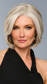 Model is wearing TAILORED ALLURE in color RL51/61 ICED GRANITA | Lightest Grey Progresses to a Deep Grey at the Nape