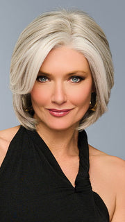 Model is wearing TAILORED ALLURE in color RL51/61 ICED GRANITA | Lightest Grey Progresses to a Deep Grey at the Nape