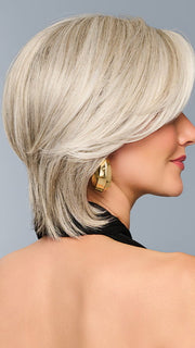 Model is wearing TAILORED ALLURE in color RL51/61 ICED GRANITA | Lightest Grey Progresses to a Deep Grey at the Nape