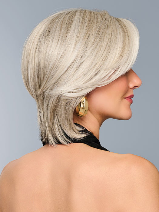Model is wearing TAILORED ALLURE in color RL51/61 ICED GRANITA | Lightest Grey Progresses to a Deep Grey at the Nape
