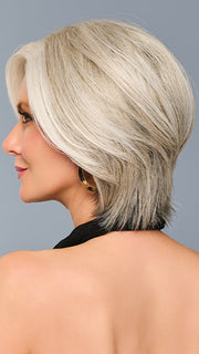 Model is wearing TAILORED ALLURE in color RL51/61 ICED GRANITA | Lightest Grey Progresses to a Deep Grey at the Nape