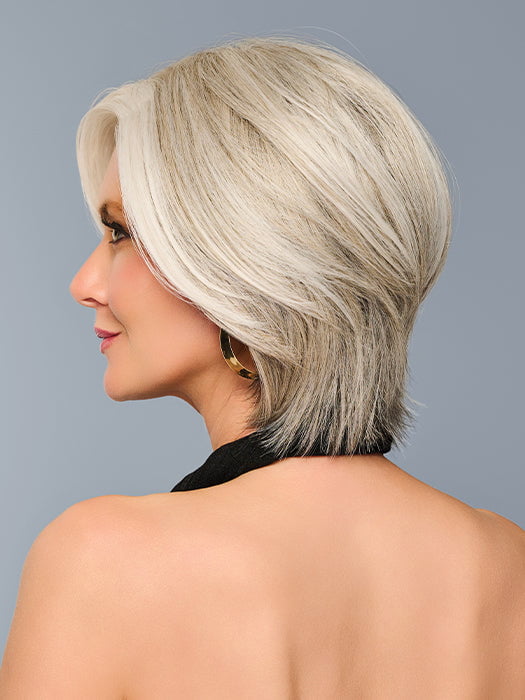 Model is wearing TAILORED ALLURE in color L51/61 ICED GRANITA | Lightest Grey Progresses to a Deep Grey at the Nape