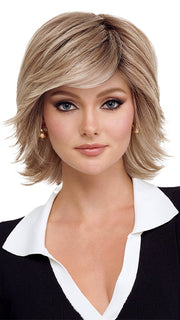 Model is wearing RAZOR CUT SHAG by TressAllure in 14/23/R8 | Light Brown blended with Platinum Blonde, Shaded with Dark Roots