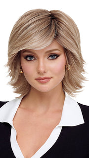 Model is wearing RAZOR CUT SHAG by TressAllure in 14/23/R8 | Light Brown blended with Platinum Blonde, Shaded with Dark Roots