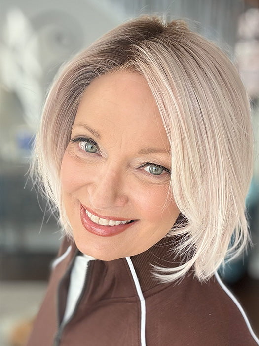 Mel B. @mels.be.ageless wearing READY by ELLEN WILLE in color PASTEL ROSE ROOTED | Pearl Platinum and Lightest Ash Blonde with Rose Pink Blend and Shaded Roots