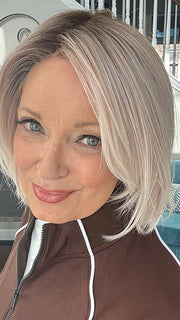 Mel B. @mels.be.ageless wearing READY by ELLEN WILLE in color PASTEL ROSE ROOTED | Pearl Platinum and Lightest Ash Blonde with Rose Pink Blend and Shaded Roots