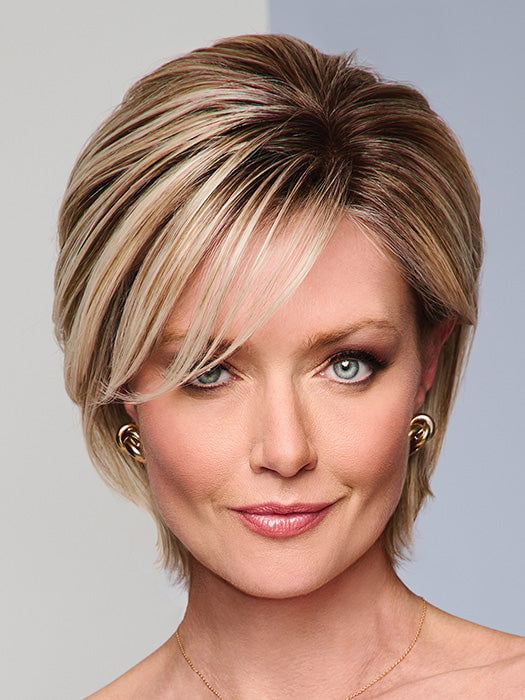 Model is wearing BOUTIQUE CHIC by RAQUEL WELCH in RL19/23SS SHADED BISCUIT | Light Ash Blonde Evenly Blended with Cool Platinum Blonde with Dark Roots