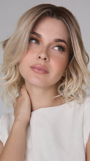Model is wearing ROHAN by AMORE in color MELTED SAND |  Rich, warm brown root melts into the neutral blond tone. Light-beige blond ends complete this stunning color.  