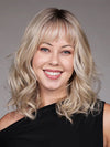 Model is wearing SIMONE in color BUTTERBEER R | Dark Brown Base and Root that transitions smoothly into a buttery blonde, infused with creamy honey and toffee tones