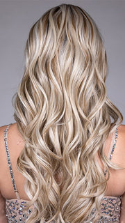 Model is wearing SOPHIA by BELLETRESS in color BUTTERBEER R | Dark Brown Base and Root that transitions smoothly into a buttery blonde, infused with creamy honey and toffee tones