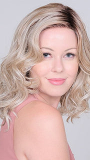Edgy barrel curls effortlessly frame the face