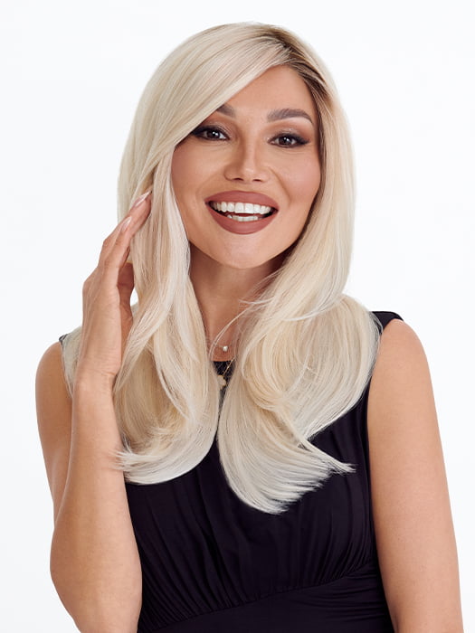 Model is wearing SENSATIONAL by TRESSALLURE in color 613/1001/R18 | Vanilla Blonde Platinum White Blend Rooted Ash Brown