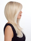 Model is wearing SENSATIONAL by TRESSALLURE in color 613/1001/R18 | Vanilla Blonde Platinum White Blend Rooted Ash Brown