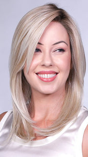 The wispy, side-swept bangs create a trendy look
