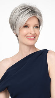Model wearing SHARI by ENVY in STERLING SHADOW | Medium Salt-and-Pepper Grey with Darker Brown Roots