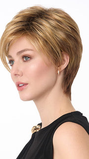 Model is wearing SHARI by ENVY in color GOLDEN NUTMEG | Medium Brown roots with overall Warm Cinnamon base and Golden Blonde highlights