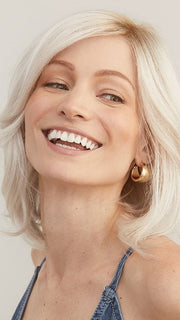 SHEENA by RENE OF PARIS in color GHOST BLONDE-R | Medium neutral blond roots fade into a pearl cream blond shade with platinum blond undertones. 