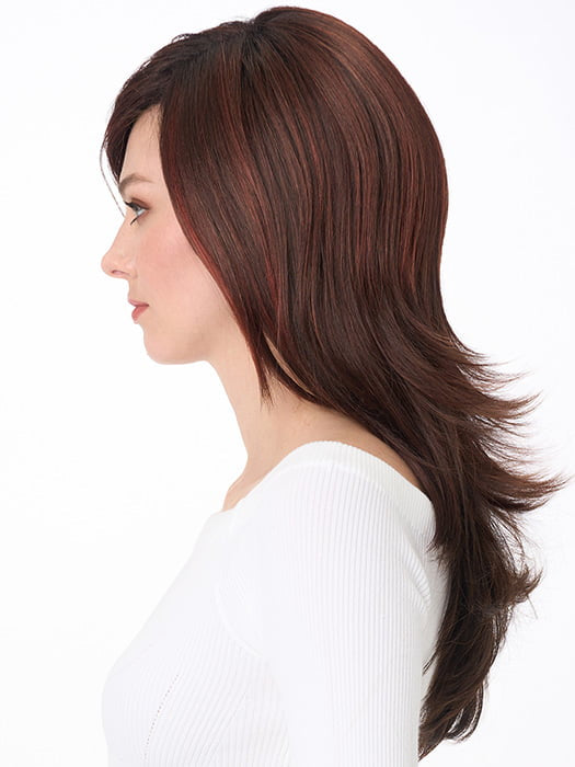 Model is wearing SHEENA by ENVY in color CHOCOLATE CHERRY | Dark Brown roots with overall Medium Brown base with Deep Red highlights