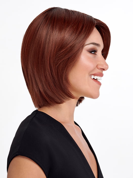Model is wearing SHEER JOY by TRESSALLURE in color 33/130/R4 | Dark Auburn Bright Auburn Blend Rooted Dark Brown