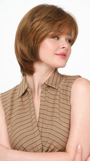 Model wearing SHEILA by ENVY in SAFFRON-SPICE | A blend of Light Coppers and Warm Auburns with Darker Brown Roots