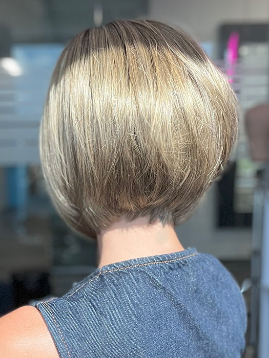 Model is wearing SHELBY by JON RENAU in color 24BT18S8 SHADED MOCHA | Medium Natural Ash Blonde & Light Natural Gold Blonde Blend, Shaded with Medium Brown