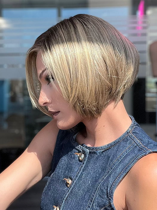 Model is wearing SHELBY by JON RENAU in color 24BT18S8 SHADED MOCHA | Medium Natural Ash Blonde & Light Natural Gold Blonde Blend, Shaded with Medium Brown