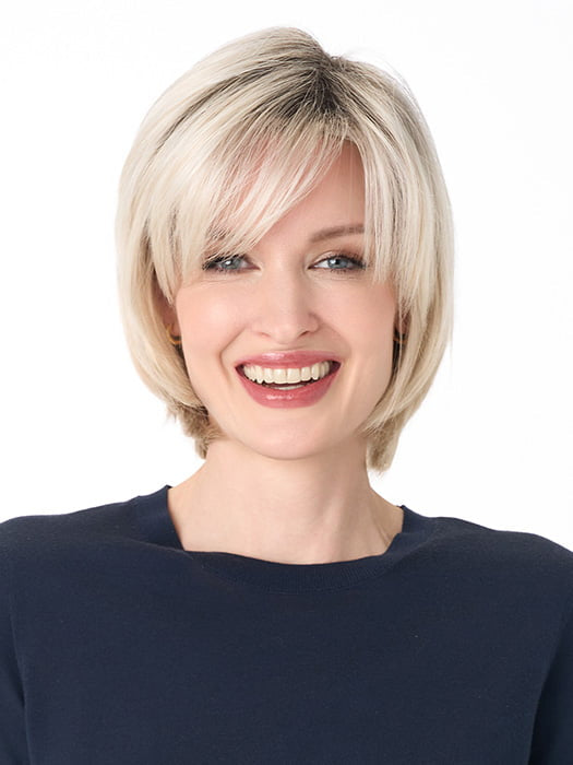 Model is wearing SHEILA by ENVY in color PLATINUM SHADOW | Light Blonde with Dark Roots
