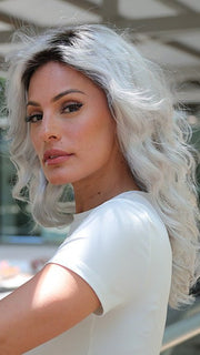 Roxie wearing REEVES by Estetica in SILVERSUN/RT8 | Iced Blonde Dusted with Soft Sand & Golden Brown Roots 