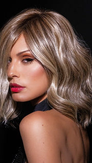 Roxie wearing SIMMER ELITE PETITE by RAQUEL WELCH in RL12/22SS SHADED CAPPUCCINO | Light Golden Brown Evenly Blended with Cool Platinum Blonde Highlights with Dark Roots