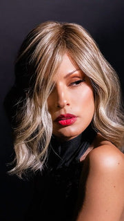 Roxie wearing color RL12/22SS SHADED CAPPUCCINO | Light Golden Brown Evenly Blended with Cool Platinum Blonde Highlights with Dark Roots
