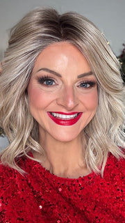Sandy @i_be_wiggin wearing SIMMER by RAQUEL WELCH WIGS in color RL19/23SS SHADED BISCUIT | Light Ash Blonde Evenly Blended with Cool Platinum Blonde and Dark Roots