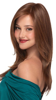 The long straight wig has soft curtain bangs that blend into feathery layers for a trendy hairstyle