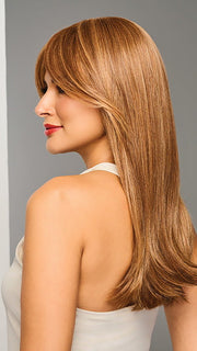 Model is wearing SLEEK SOPHISTICATION by RAQUEL WELCH in color RL30/27 RUSTY AUBURN | Medium Auburn Evenly Blended with Strawberry Blonde