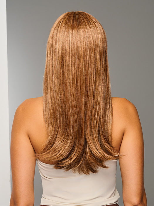 Model is wearing SLEEK SOPHISTICATION by RAQUEL WELCH in color RL30/27 RUSTY AUBURN | Medium Auburn Evenly Blended with Strawberry Blonde