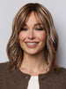 Model is wearing SMOOTH WAVEZ in color SNOWY UMBER R | Medium Ginger Brown base with White Blond highlights