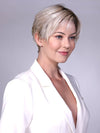 Model is wearing SOHO in CRUSHED ALMOND BLONDE R | A soft Neutral Light Blonde with a Light and Medium Blended Root Color