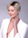 Model is wearing SOHO in CRUSHED ALMOND BLONDE R | A soft Neutral Light Blonde with a Light and Medium Blended Root Color