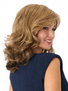 Model is wearing SONIA by ENVY in color TOASTED SESAME | Medium Brown roots with overall Warm Cinnamon base and Golden Blonde highlights