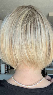 Carly @carlynwilson84 wearing Straight Up With a Twist by Raquel Welch in color SS19/23 SHADED BISCUIT | Cool Platinum blonde with subtle highlights and medium brown roots