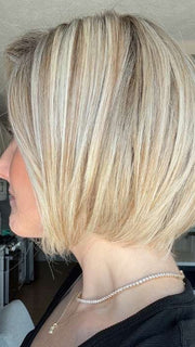 Carly @carlynwilson84 wearing Straight Up With a Twist by Raquel Welch in color SS19/23 SHADED BISCUIT | Cool Platinum blonde with subtle highlights and medium brown roots