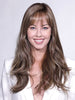 Model is wearing TORY V by BelleTress in color TOASTED WALNUT R | Medium Brown Rooted, Ash Brown, Medium Gold Blonde, and Light Brown Blended to perfection
