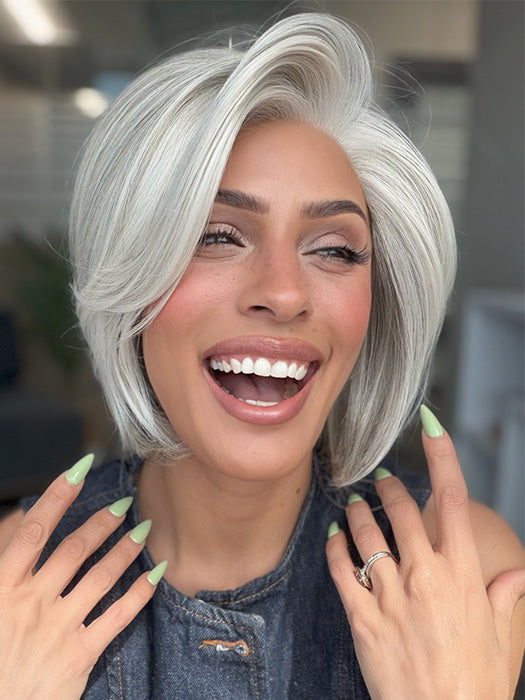 Model is wearing TAILORED ALLURE by RAQUEL WELCH in color TAILORED ALLURE in color L51/61 ICED GRANITA | Lightest Grey Progresses to a Deep Grey at the Nape