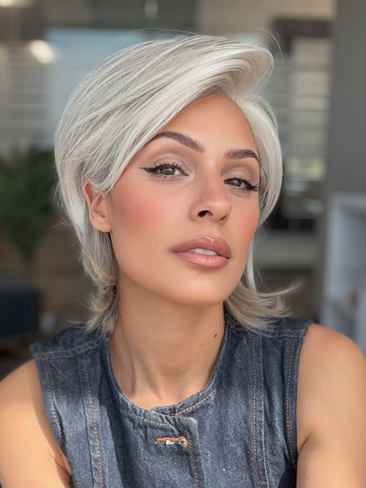 Model is wearing TAILORED ALLURE by RAQUEL WELCH in color TAILORED ALLURE in color L51/61 ICED GRANITA | Lightest Grey Progresses to a Deep Grey at the Nape